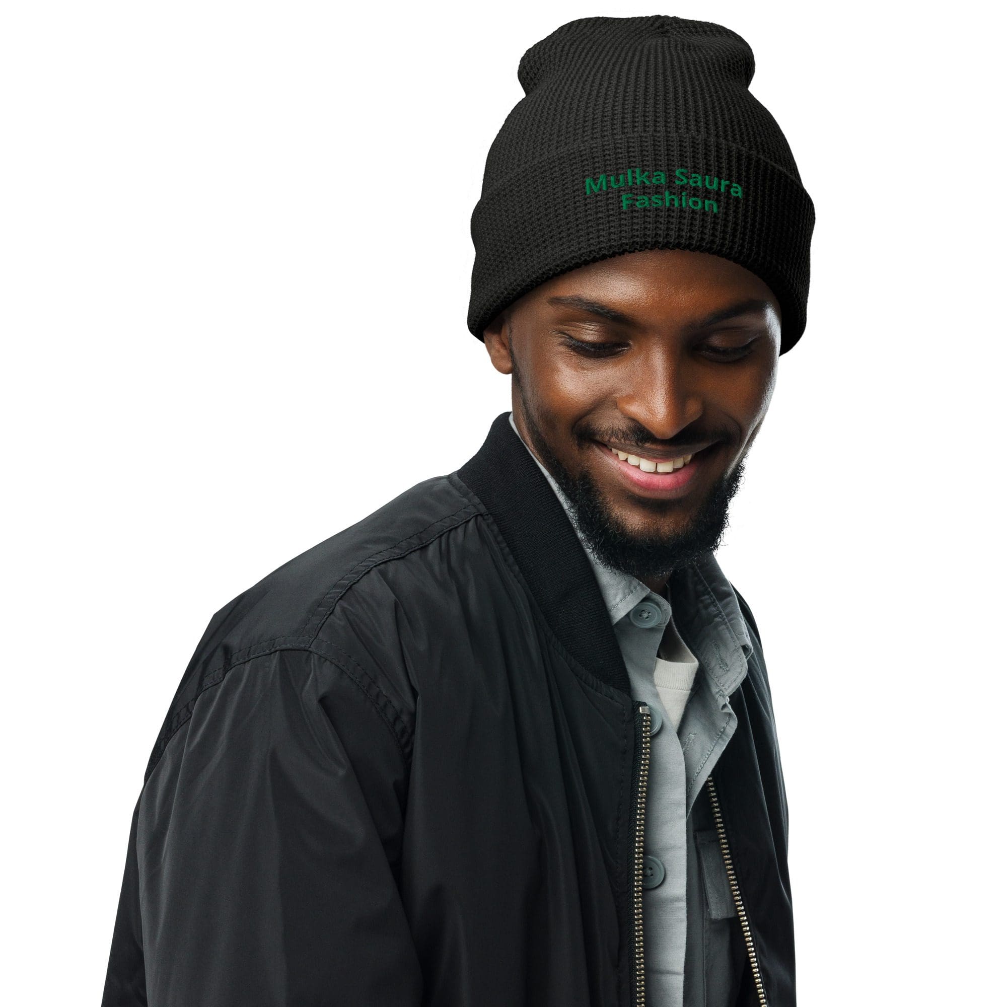 Man wearing black beanie and jacket.