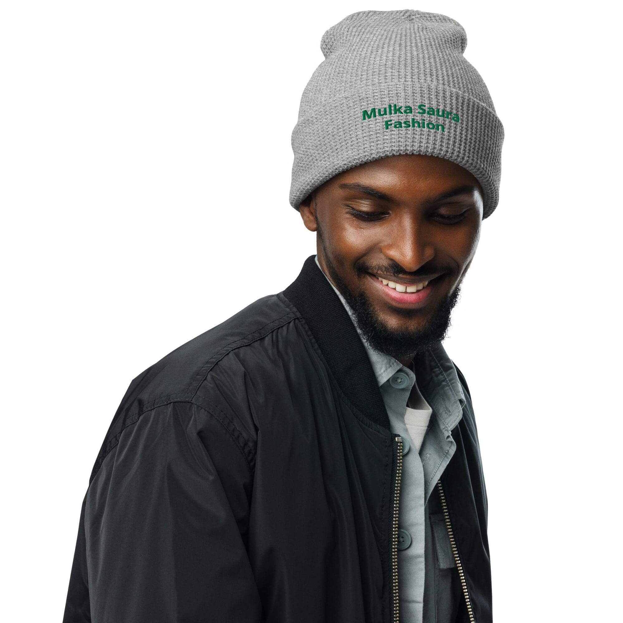 Man wearing gray beanie and black jacket.