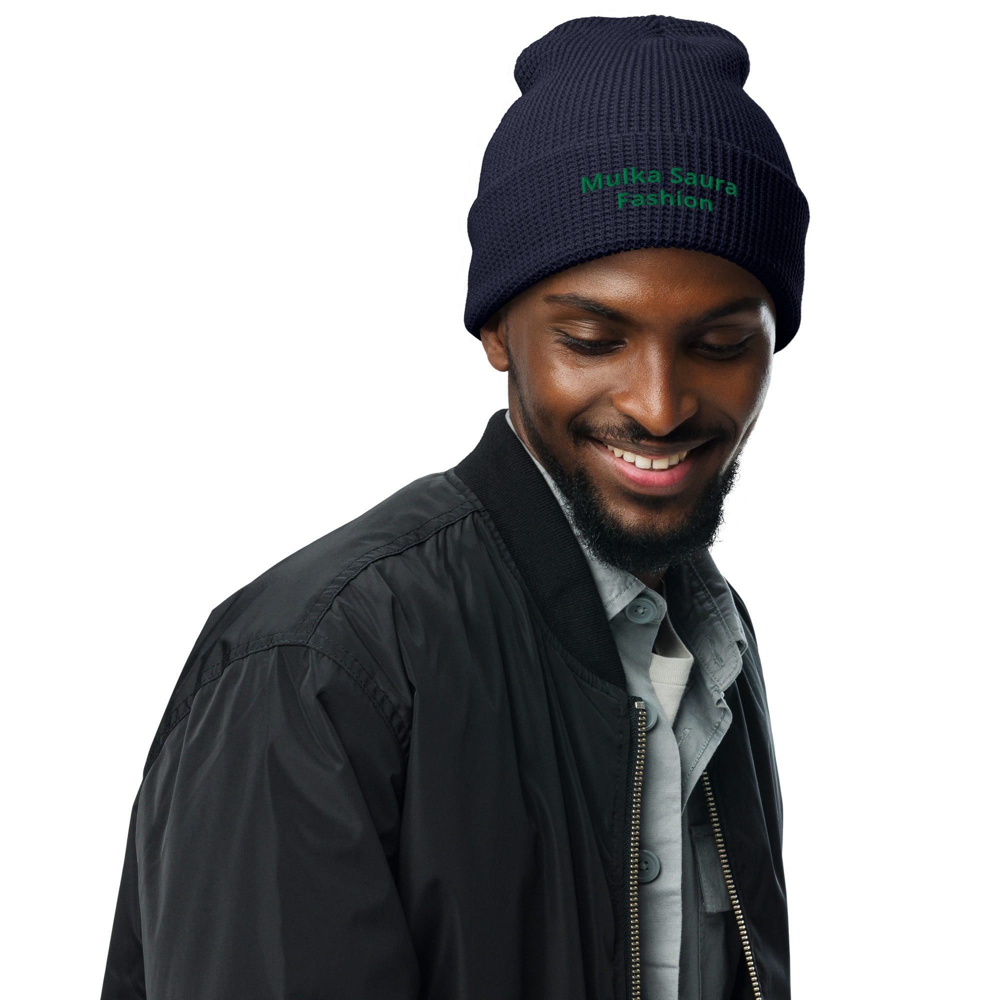 Man wearing a beanie and black jacket.