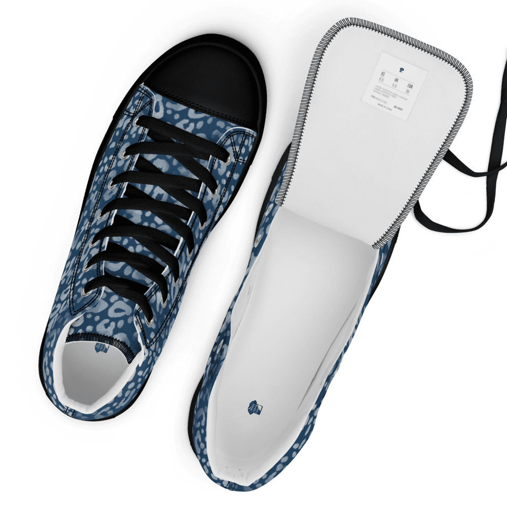 Blue patterned canvas sneakers showing one insole