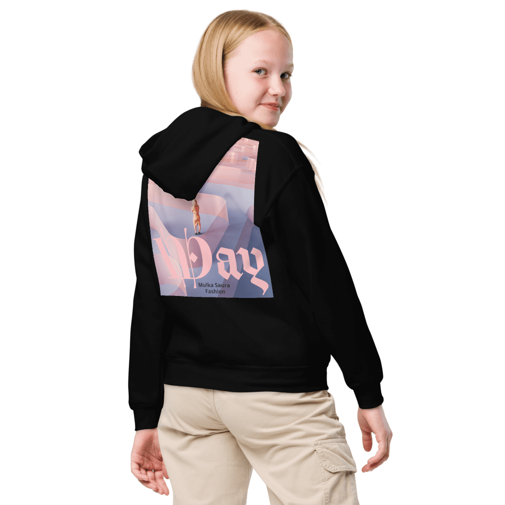 Girl wearing a black hoodie with design.