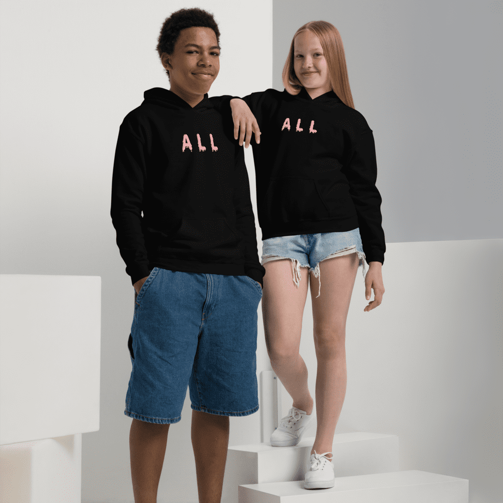 Two people in matching black hoodies.