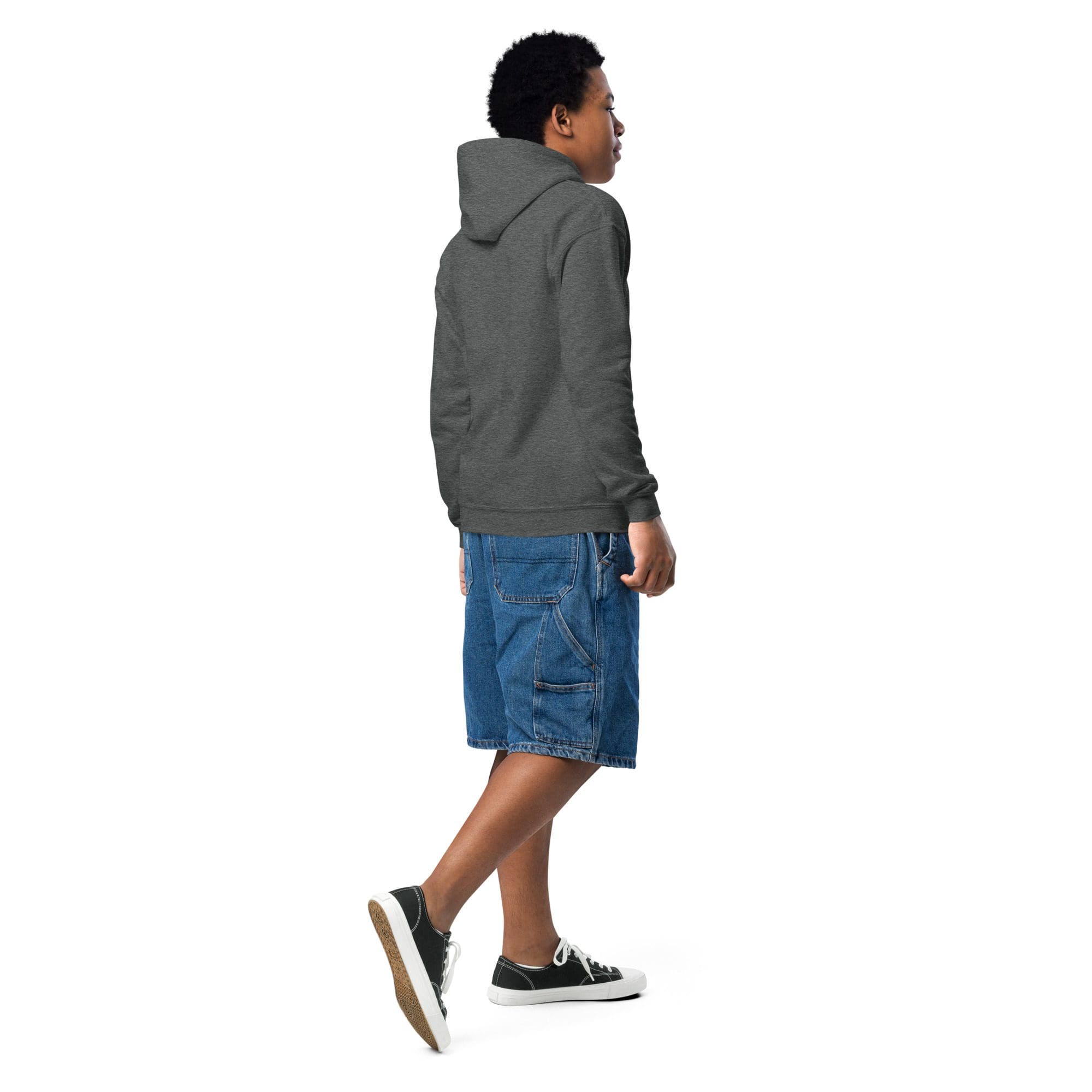 Teen in gray hoodie and denim shorts
