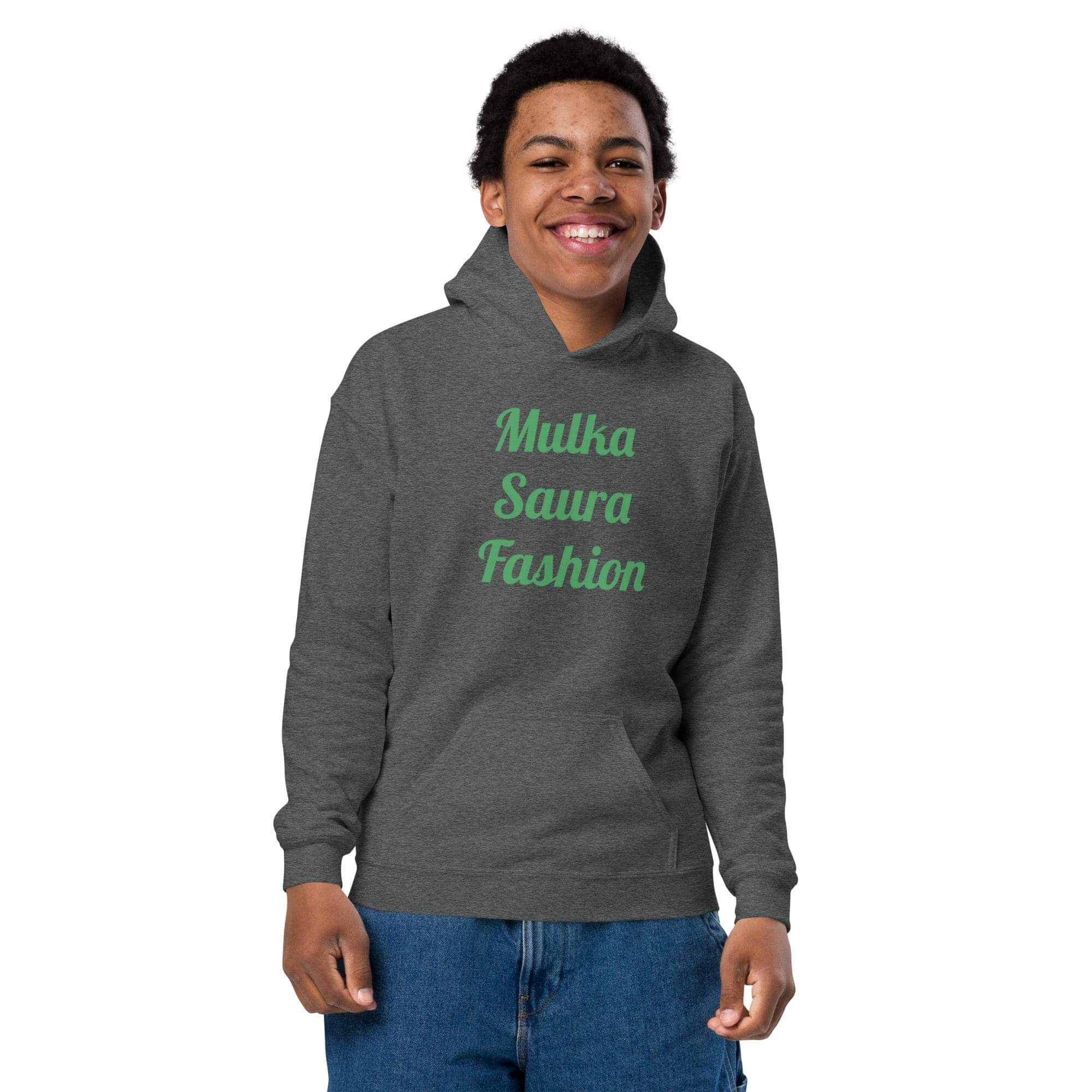 Young person wearing gray "Mulka Saura Fashion" hoodie