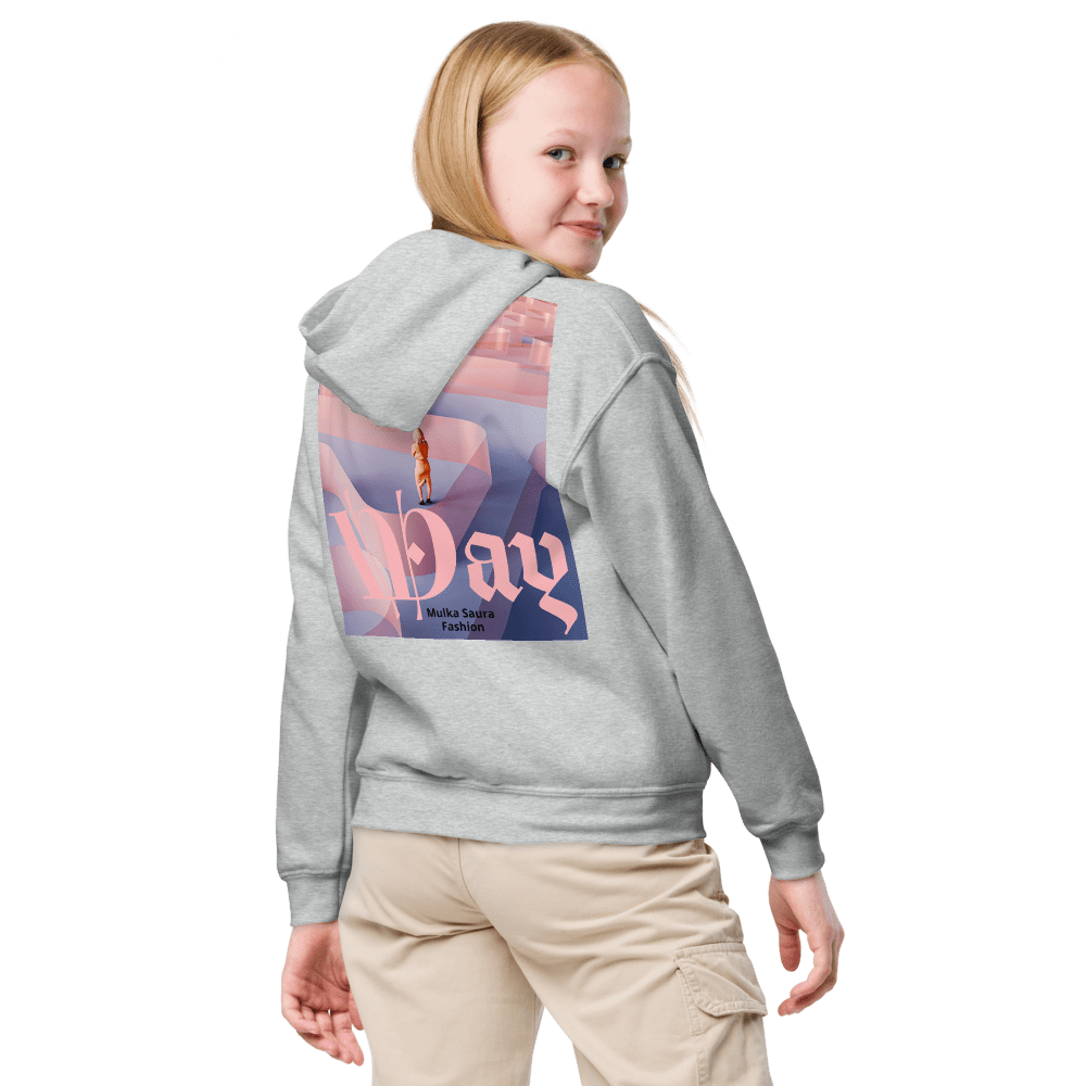 Girl wearing a hoodie with graphic design.