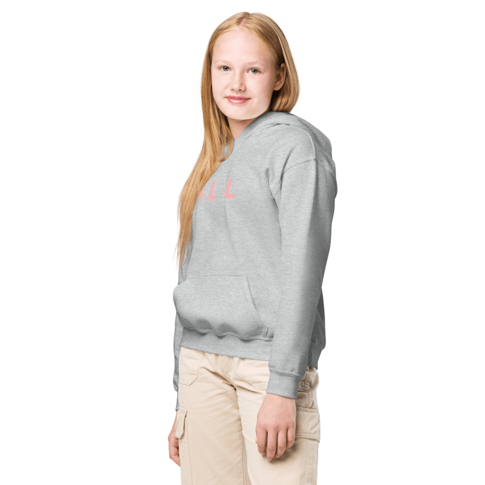 Girl wearing gray hoodie, black background.