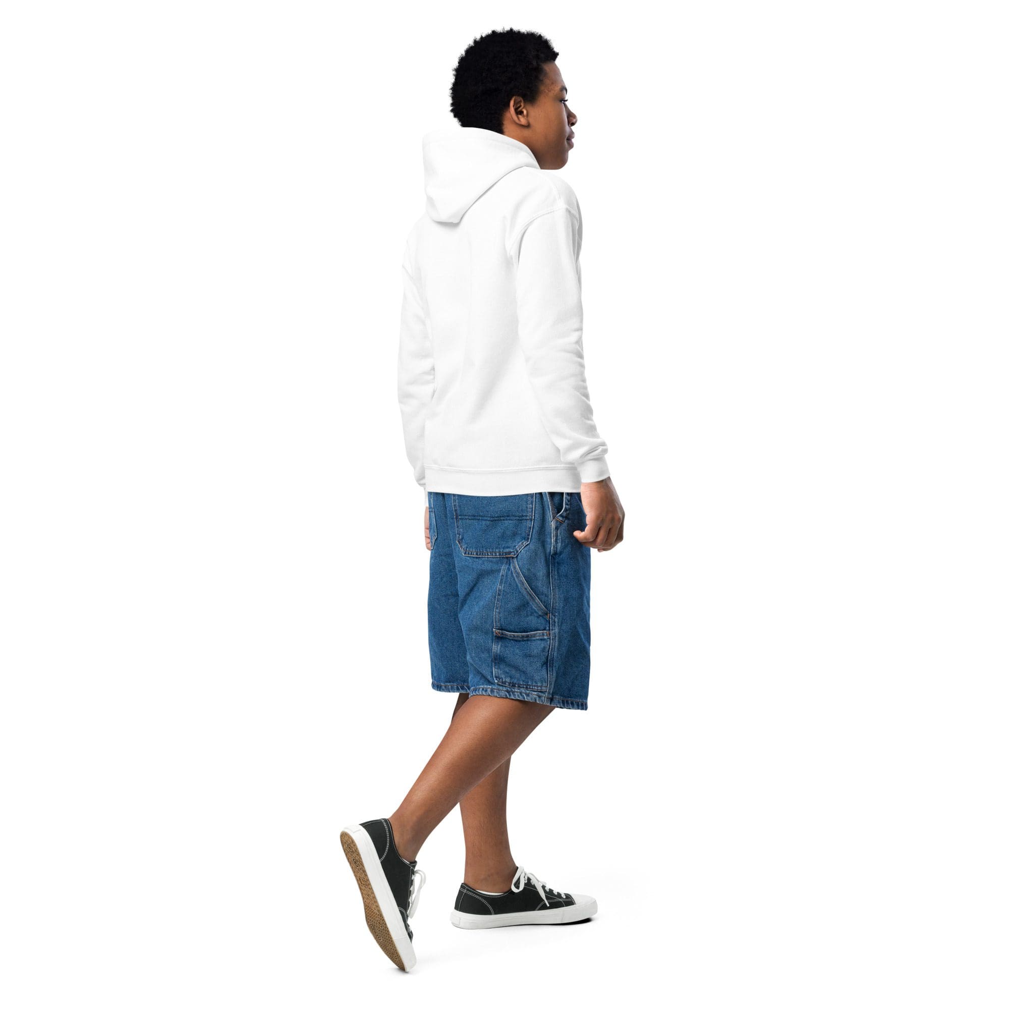 Person in white hoodie and denim shorts.