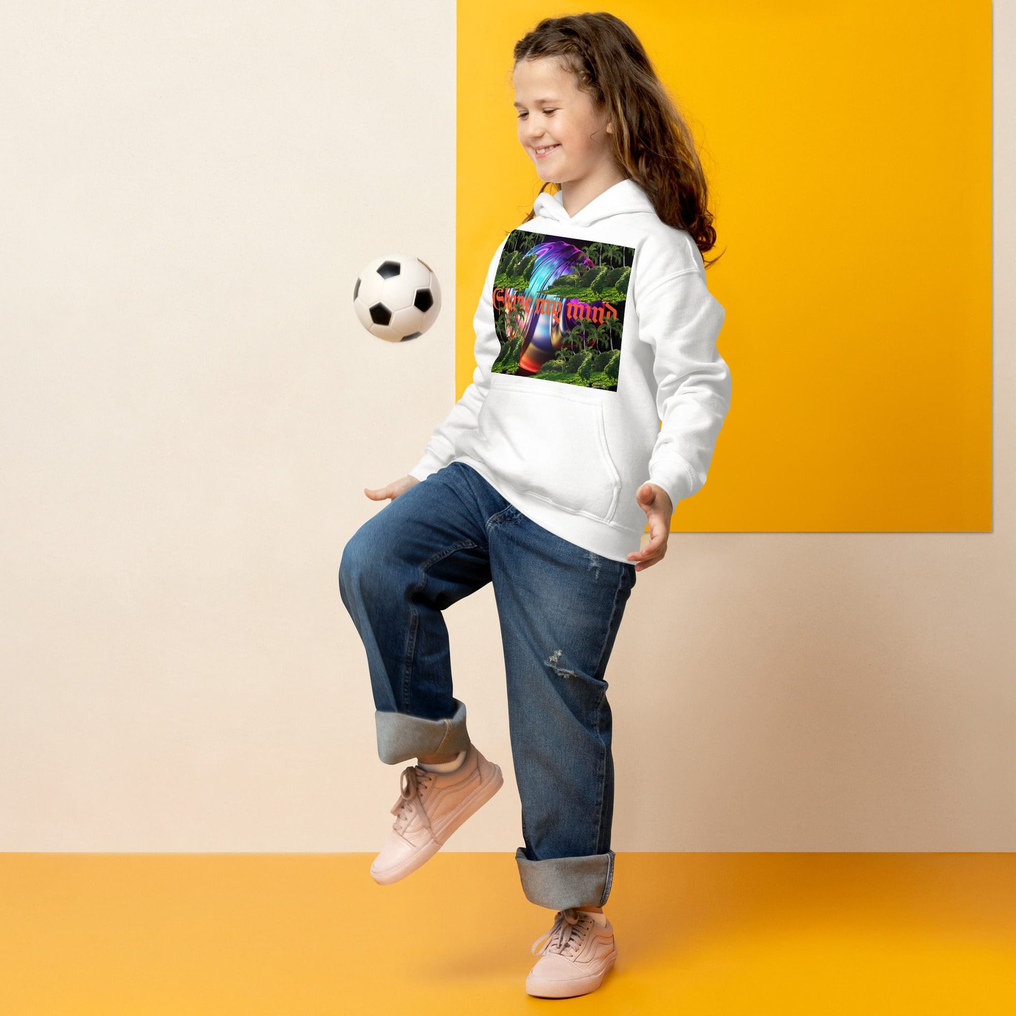 Girl playing with soccer ball indoors.