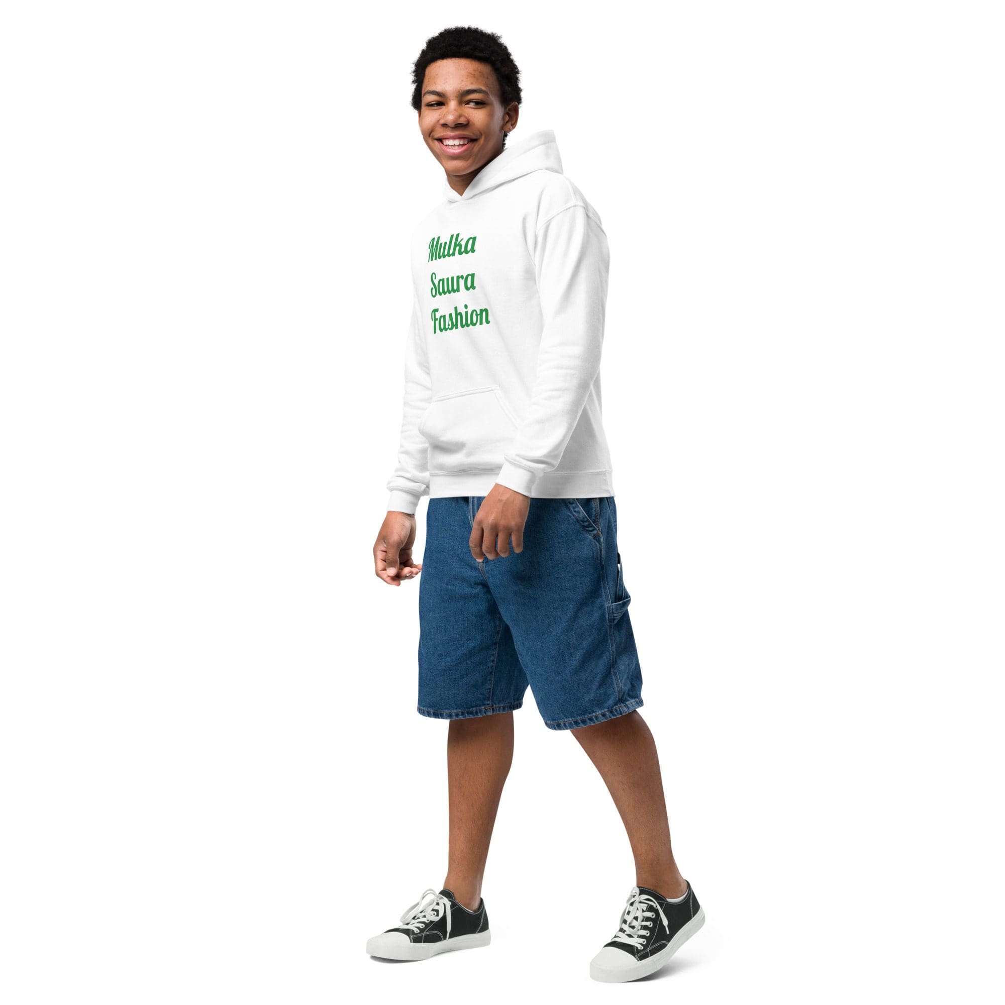 Smiling person in white hoodie and shorts