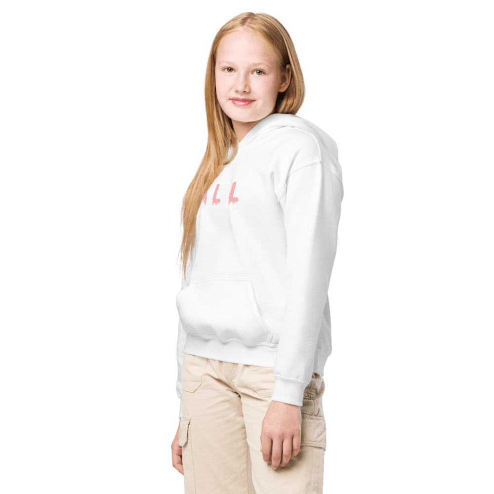 Girl in white hoodie, beige pants.