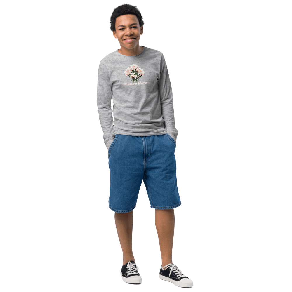 Smiling person in casual outfit on black background.