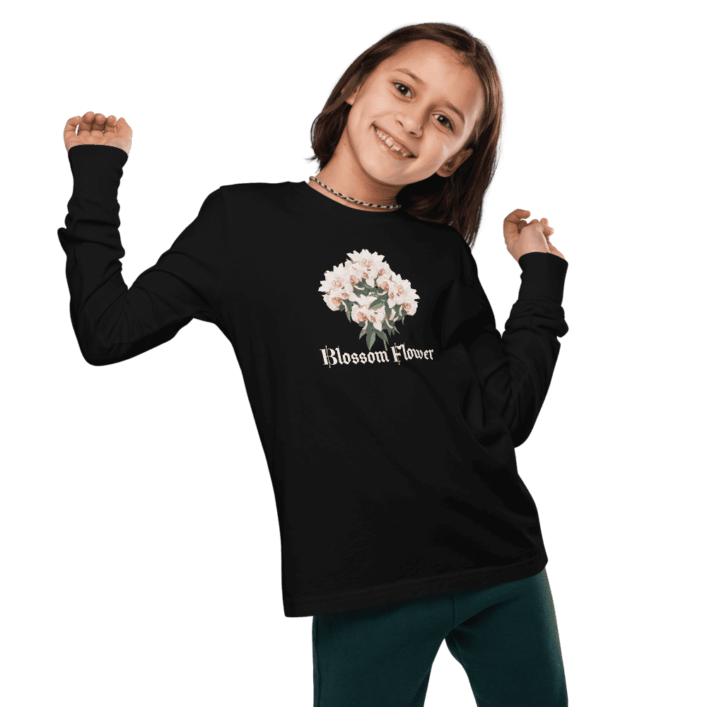Smiling child wearing "Blossom Flower" shirt.