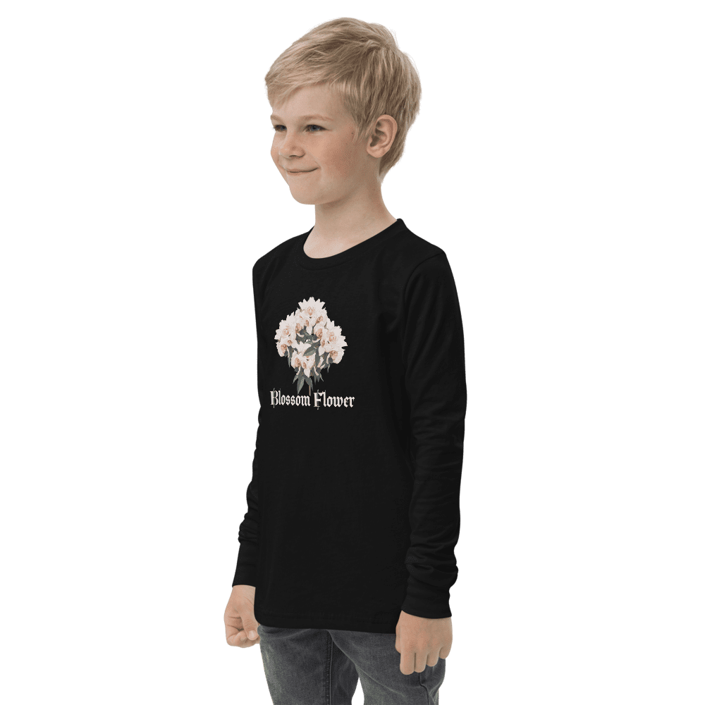 Child wearing "Blossom Flower" black shirt.
