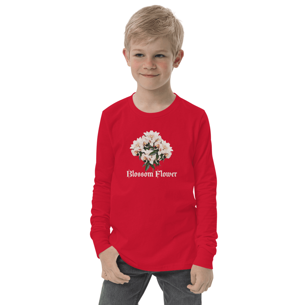 Child wearing red floral print shirt.