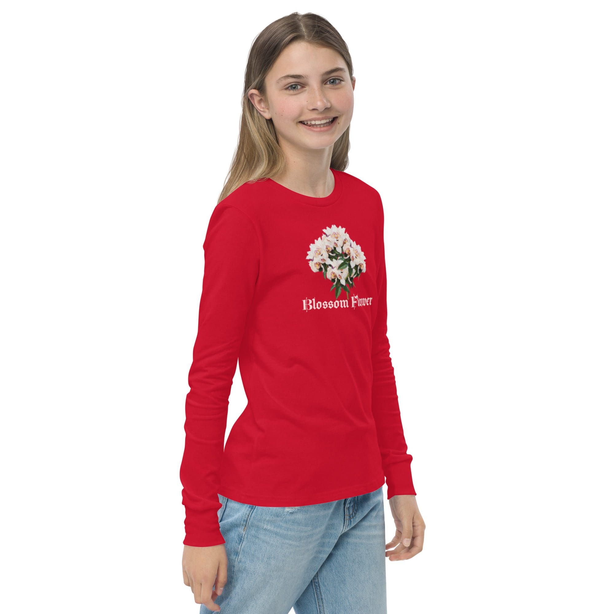 Smiling girl in red floral shirt.