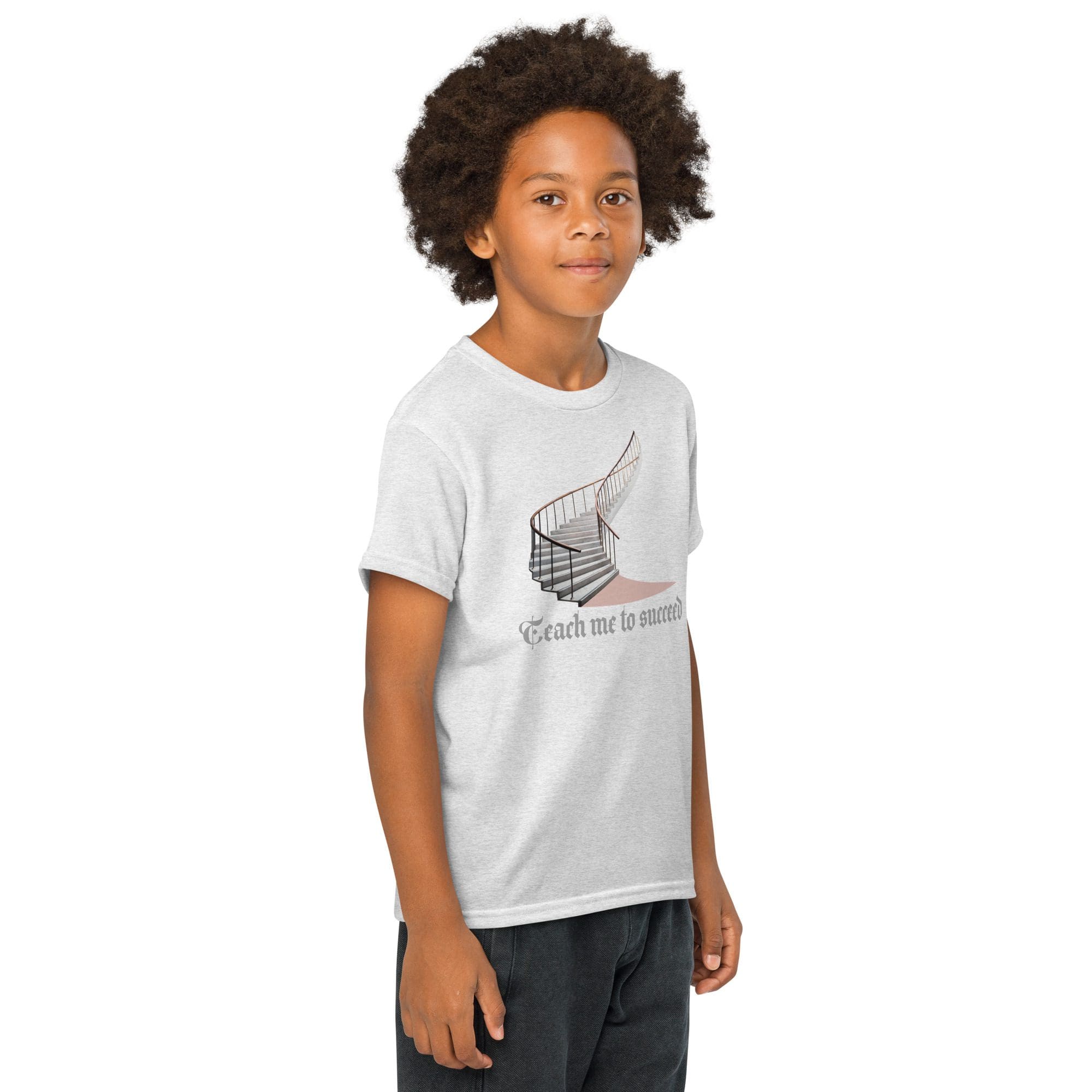 Child wearing "Teach me to surf" shirt.