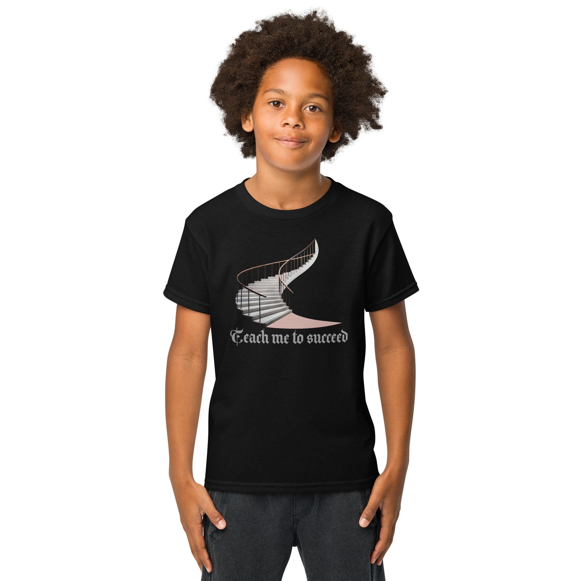Boy wearing "Teach me to succeed" shirt.