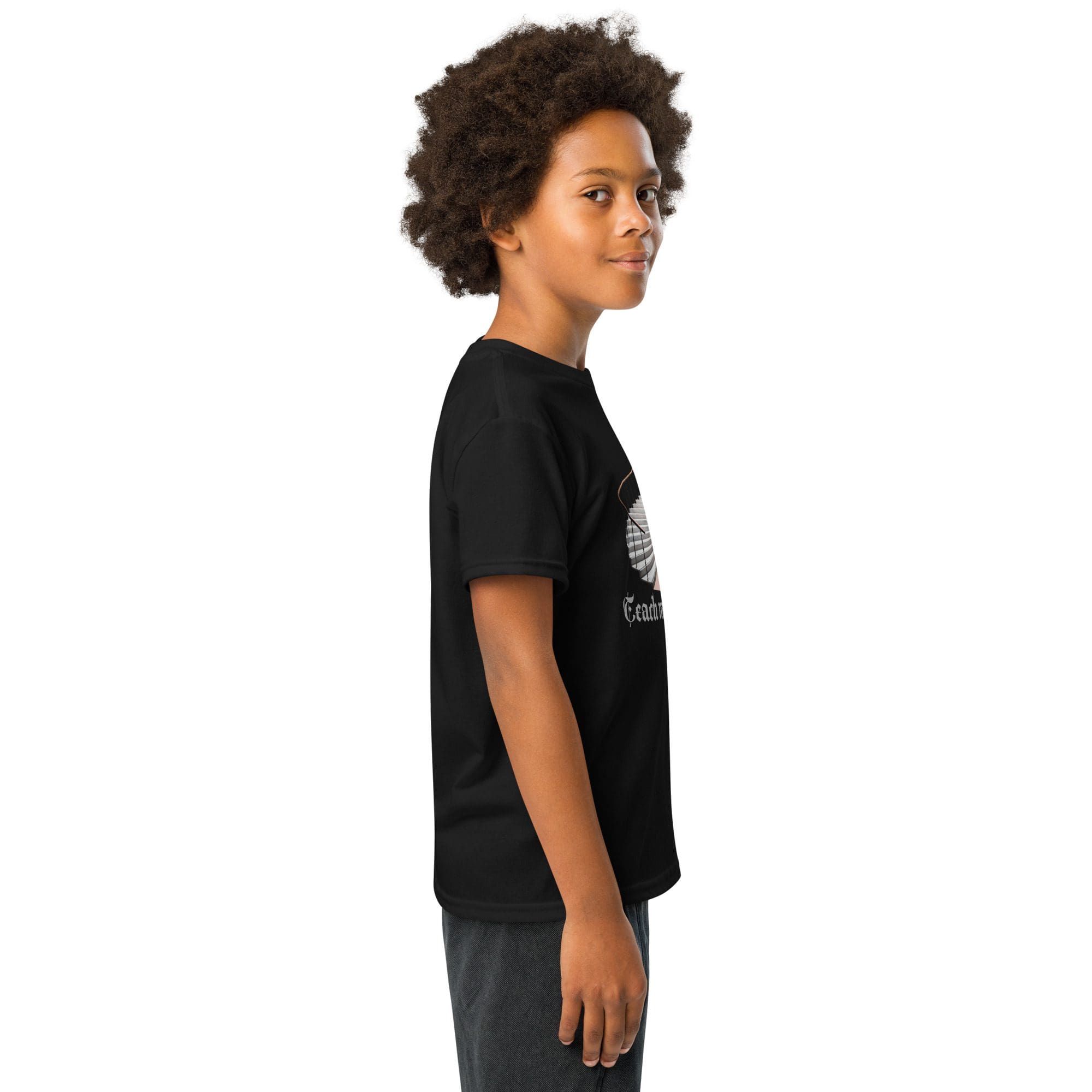 Smiling child in black t-shirt, side profile