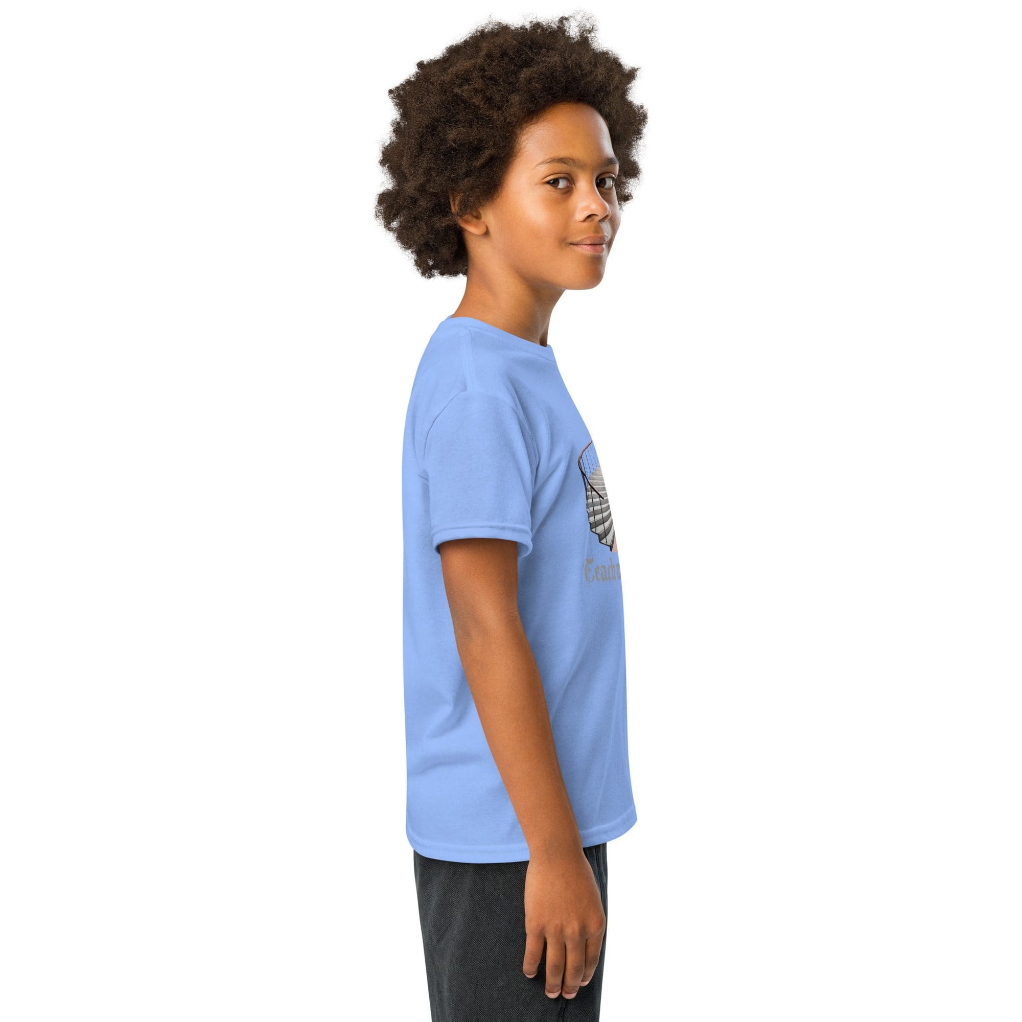 Young boy in blue t-shirt side view