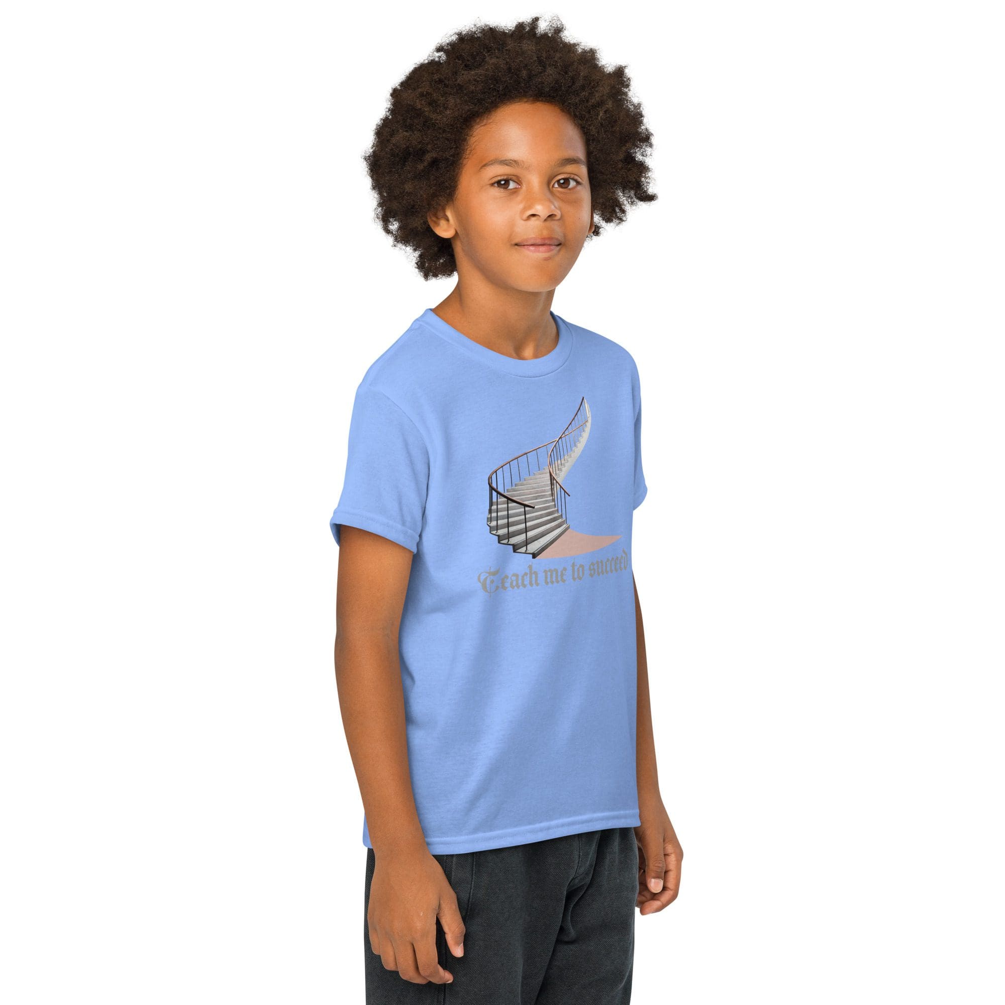 Child wearing a blue graphic t-shirt.