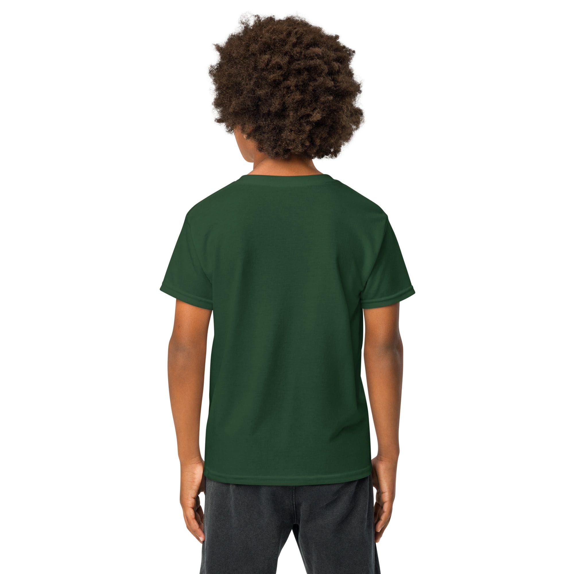 Child in green shirt facing away outdoors.