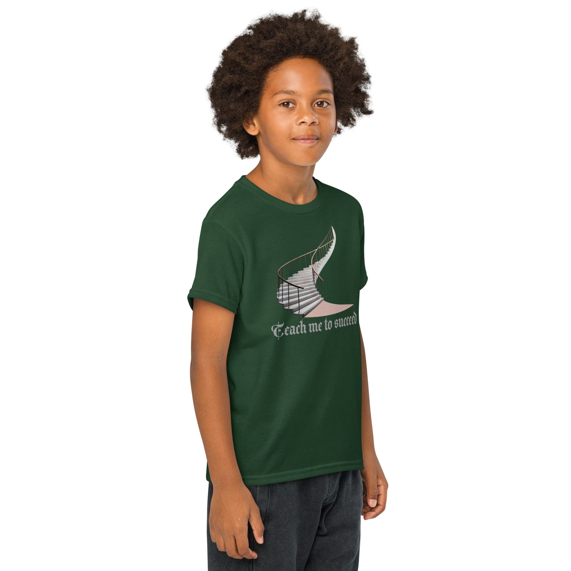 Child in green shirt with musical design.