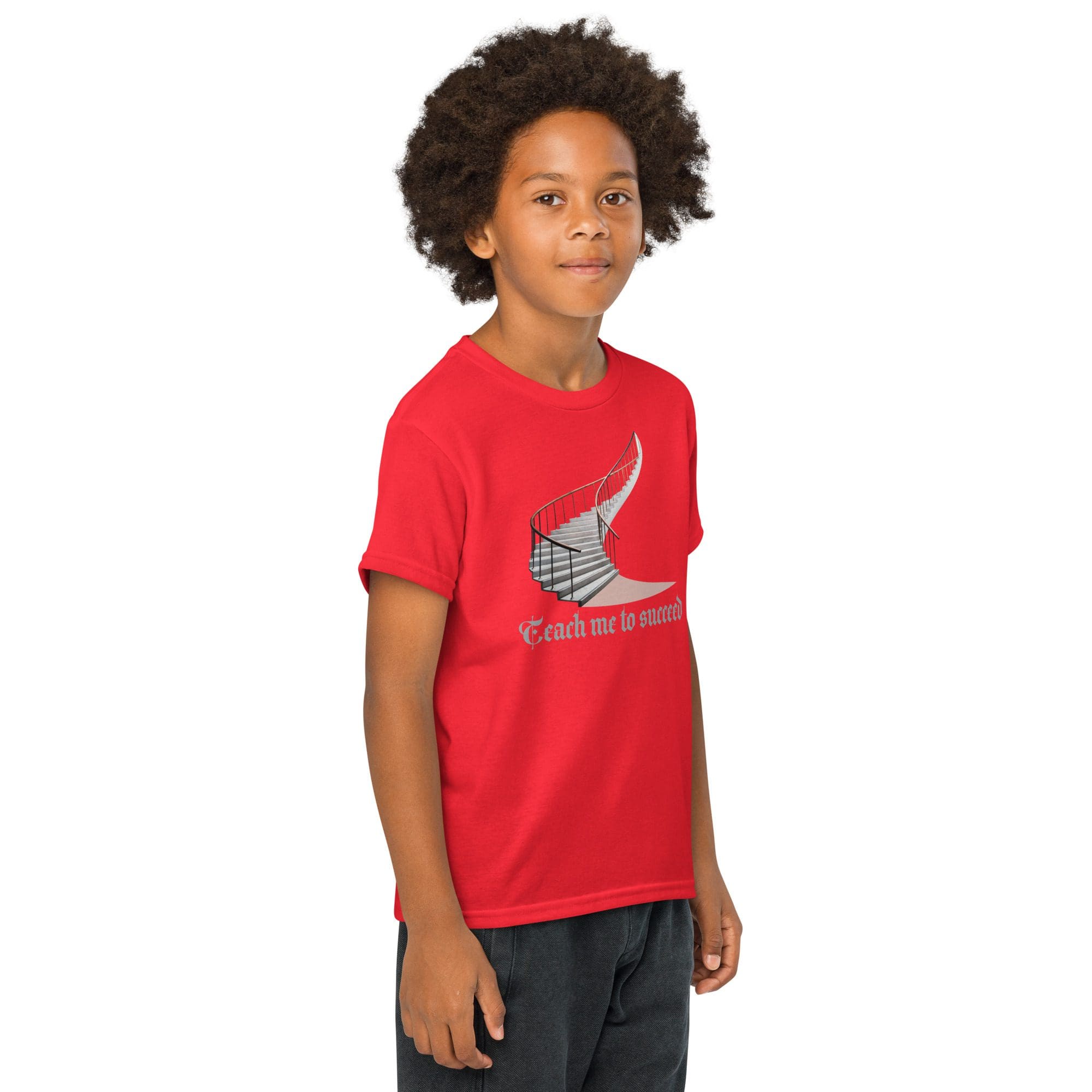 Child in red t-shirt, confident pose.