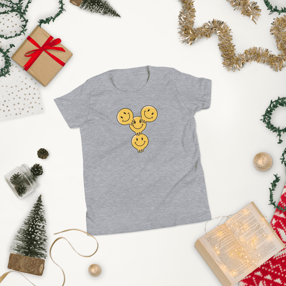 Gray t-shirt with smiley faces design.