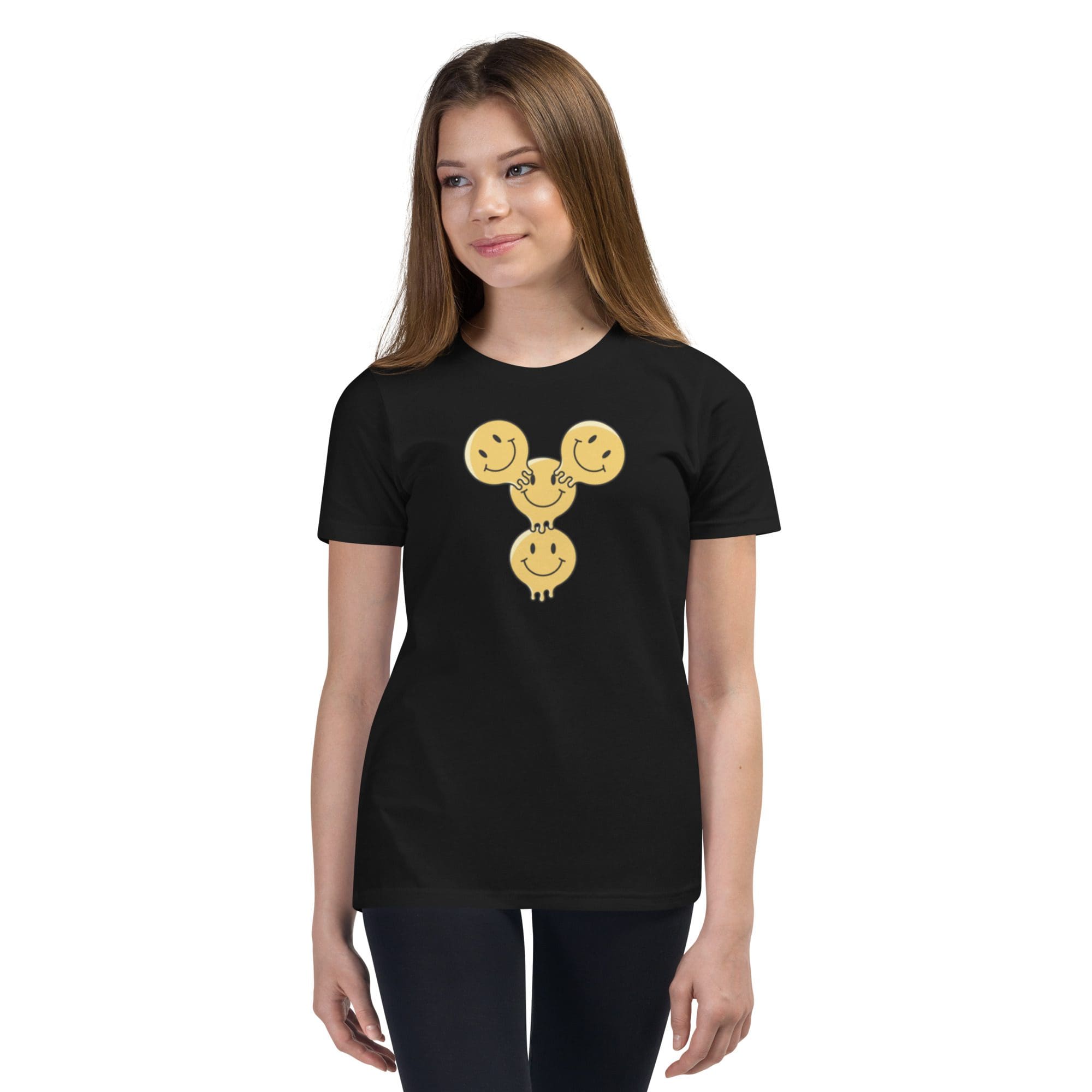 Girl wearing black t-shirt with smiley design.