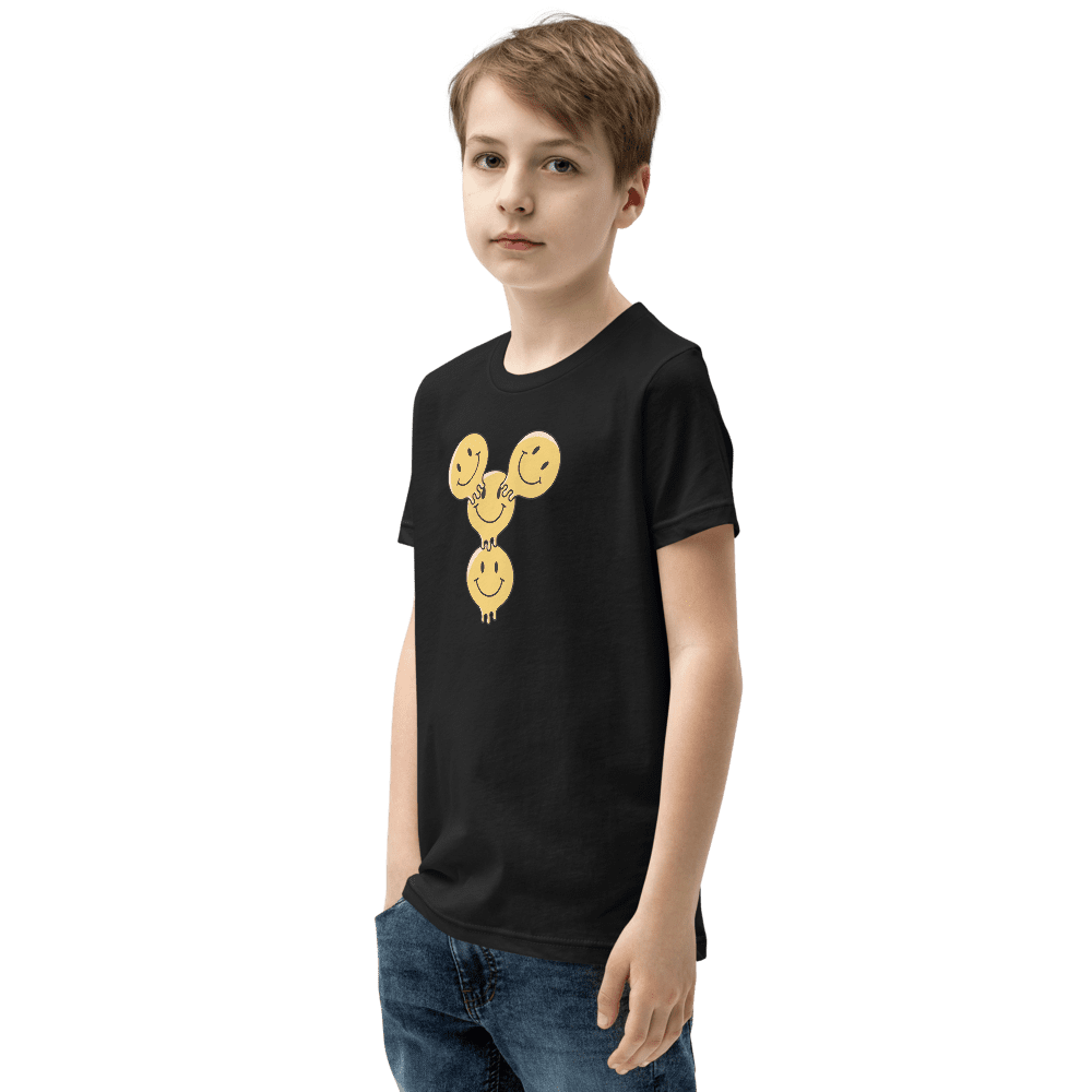 Boy wearing black t-shirt with smiley design.