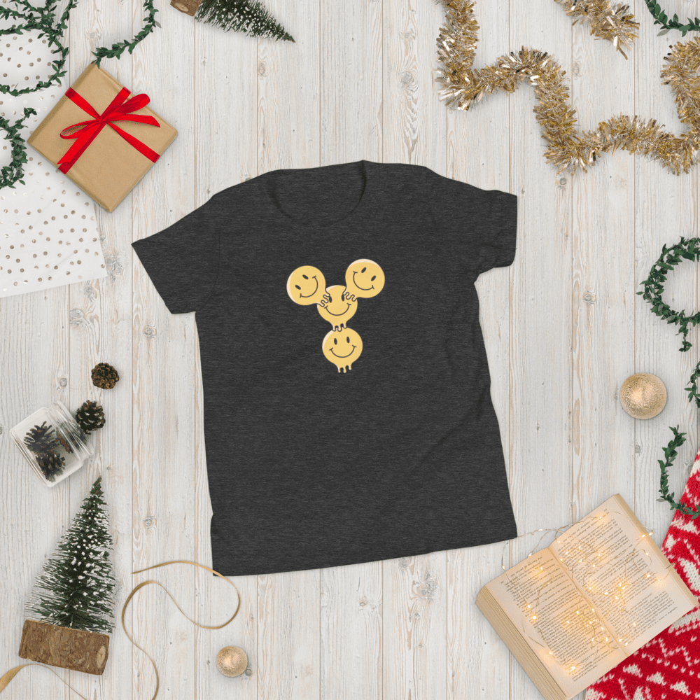 Gray T-shirt with smiling faces design.