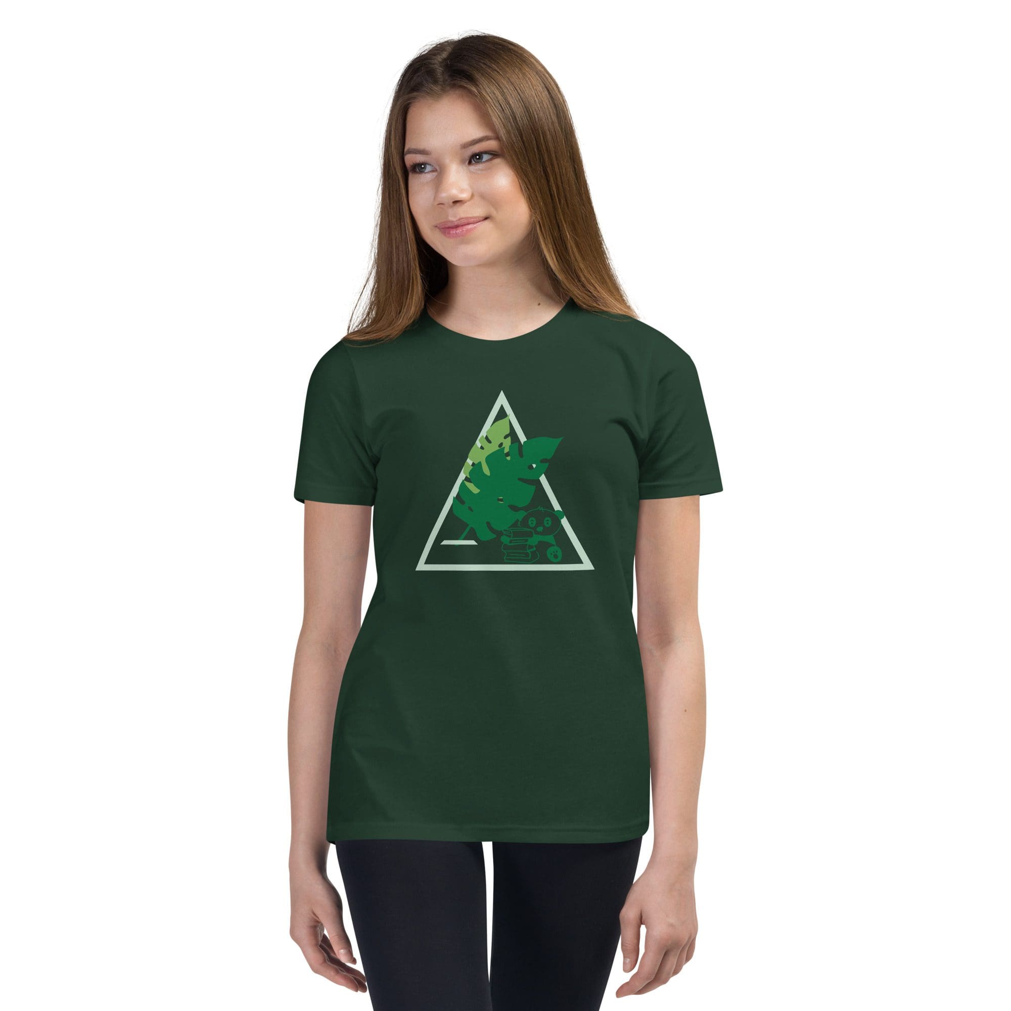Girl wearing green shirt with triangle design.