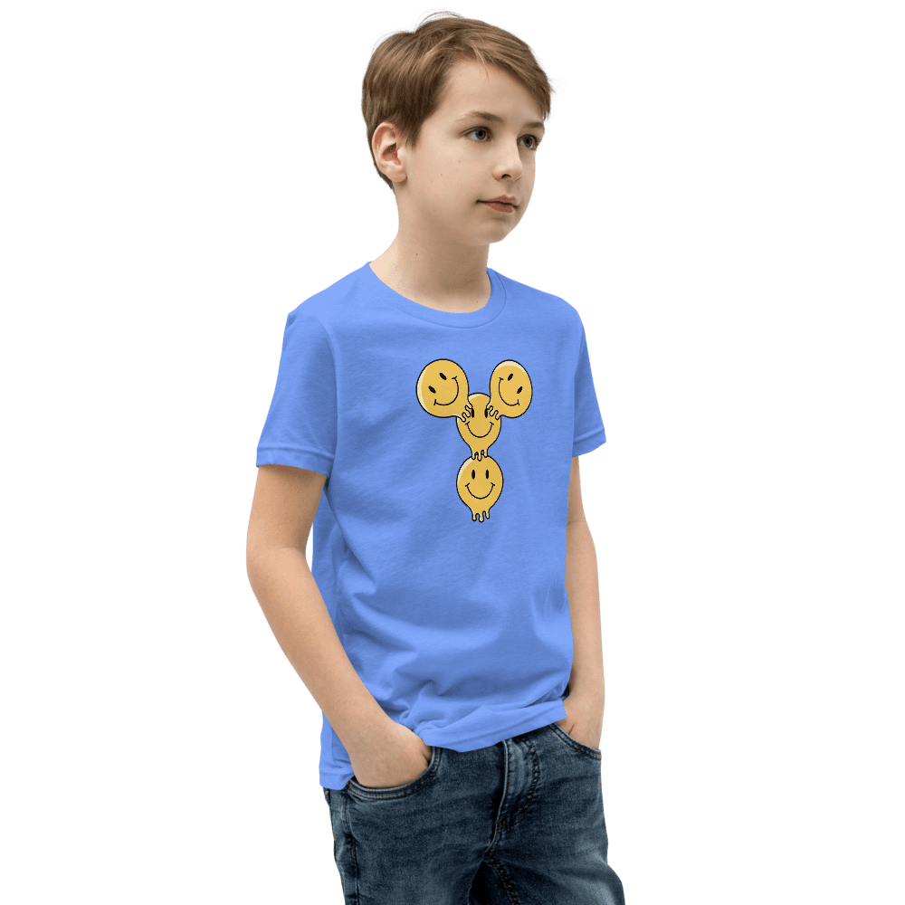 Boy wearing blue t-shirt with smiley design.