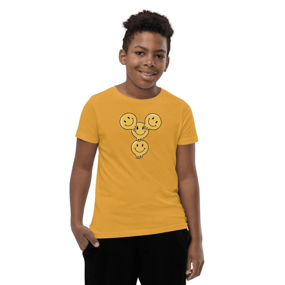Boy wearing yellow smiley face t-shirt.
