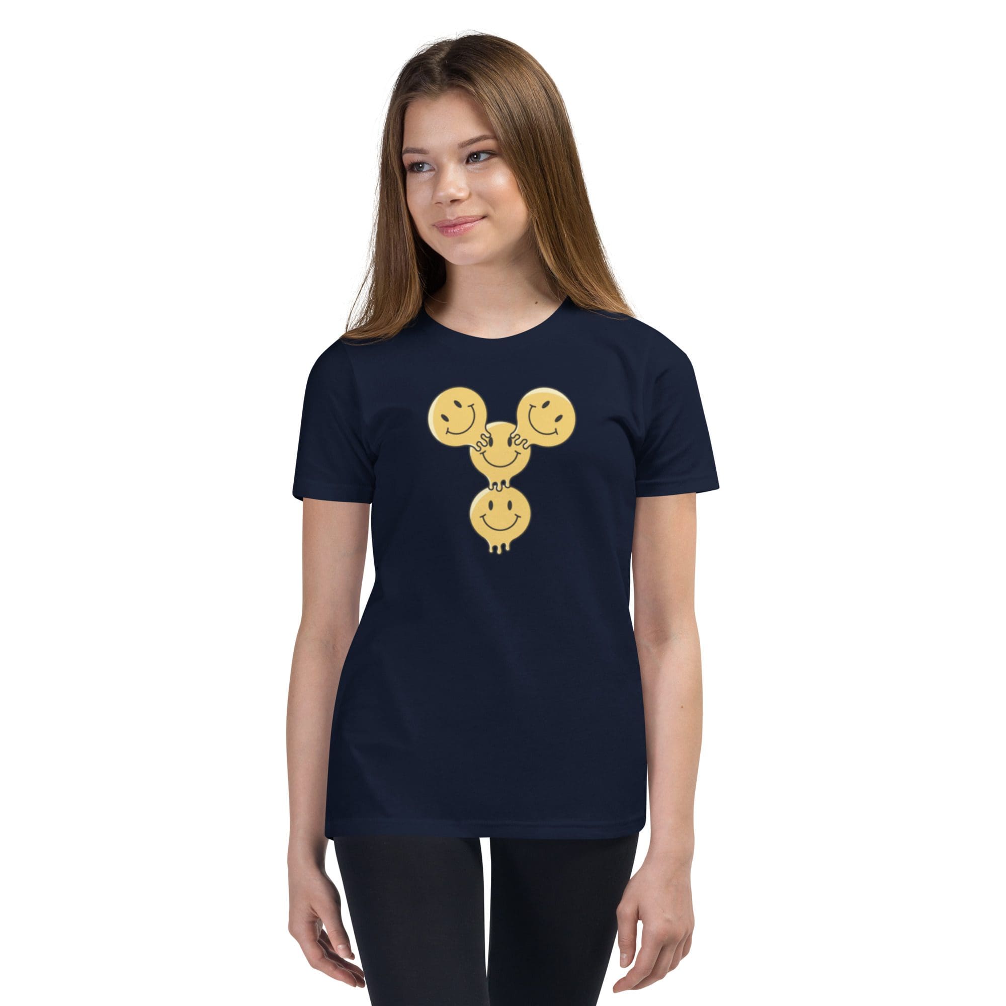 Girl in navy shirt with smiley faces.