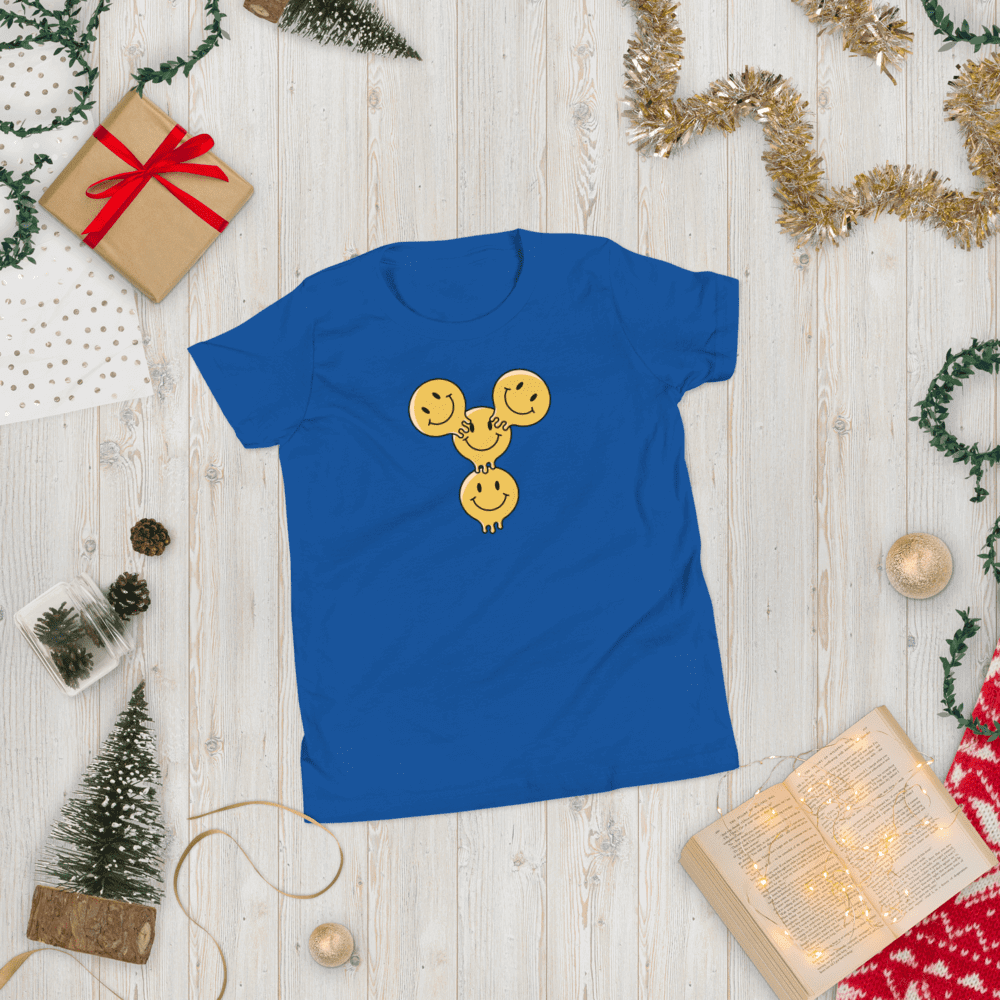 Blue T-shirt with smiling faces design.