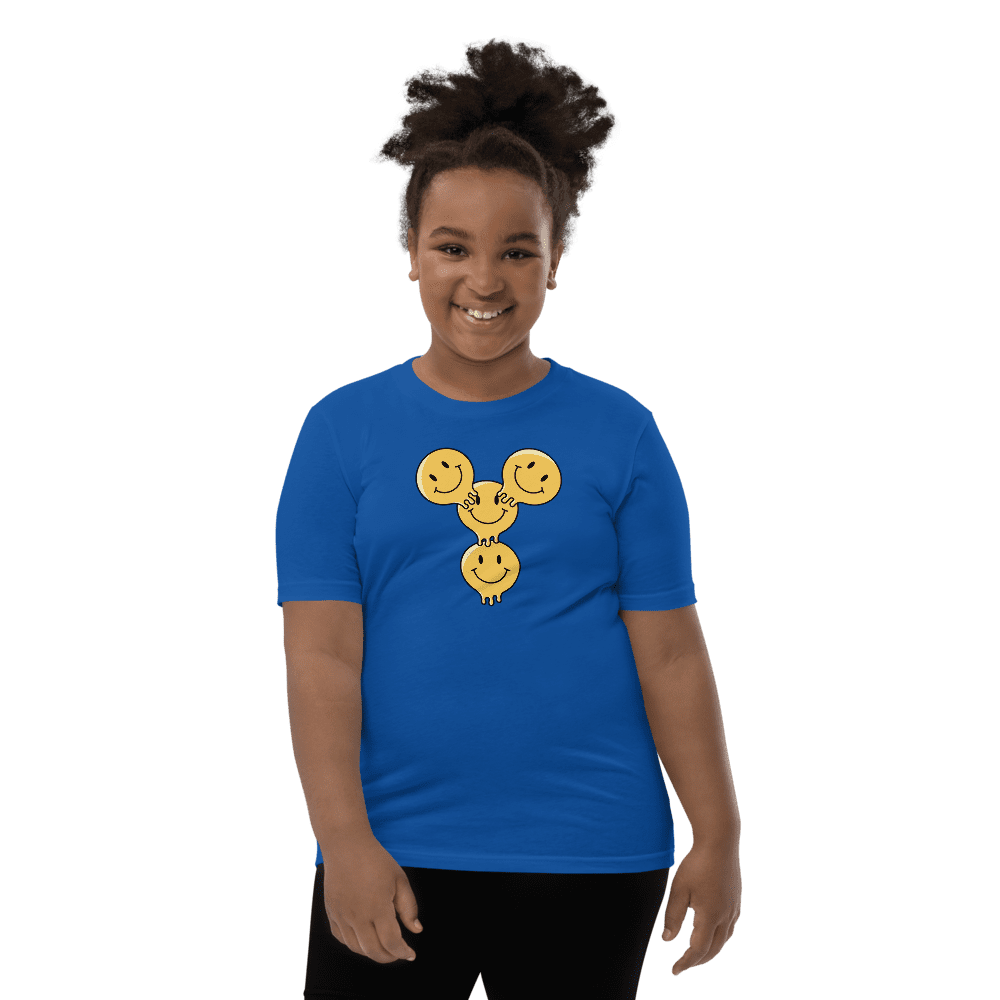 Person wearing blue shirt with smiley design.