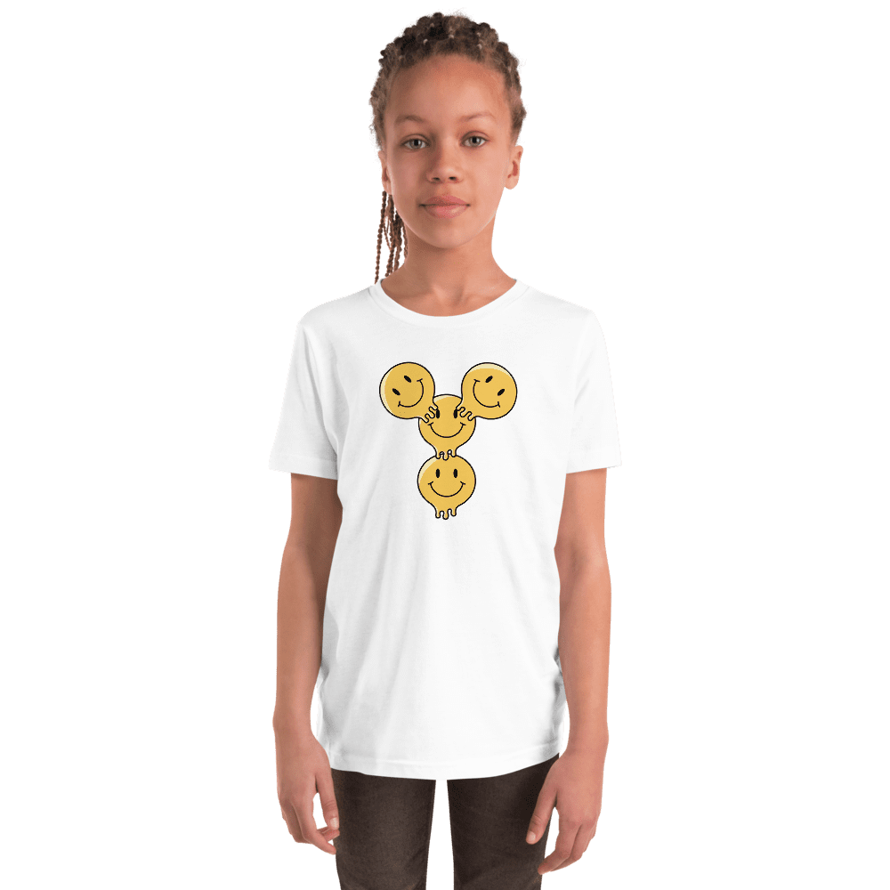 Child wearing smiley face t-shirt.