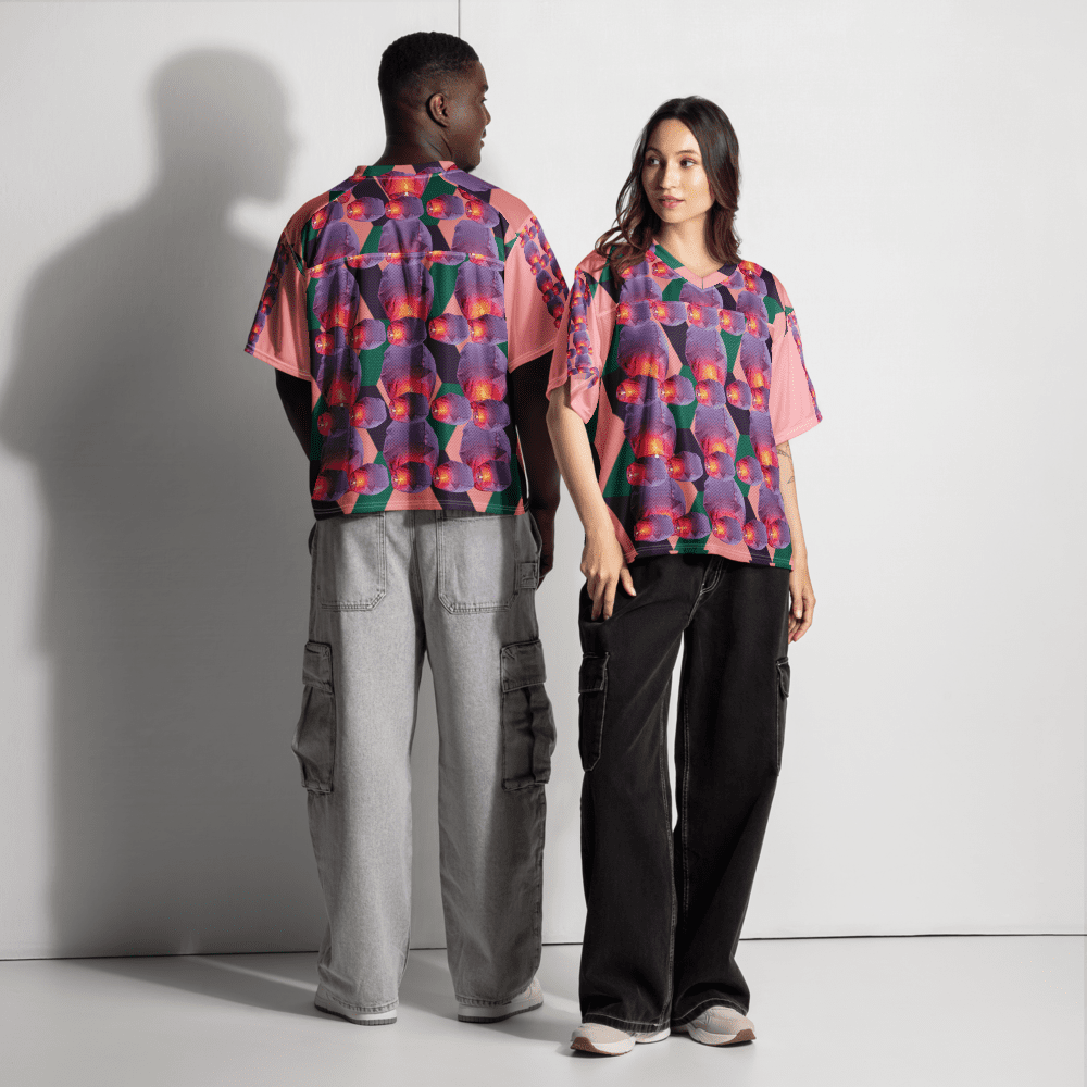 Two models wearing colorful patterned shirts