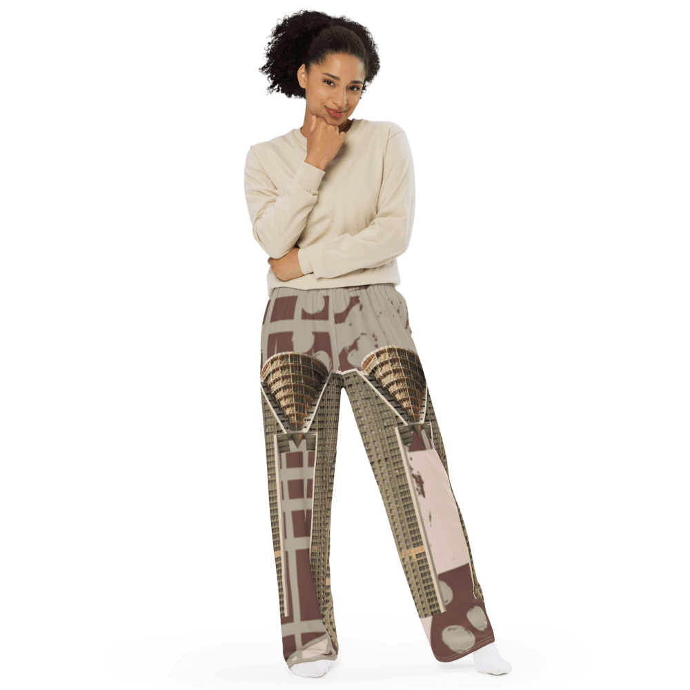 Woman in beige sweater and patterned trousers