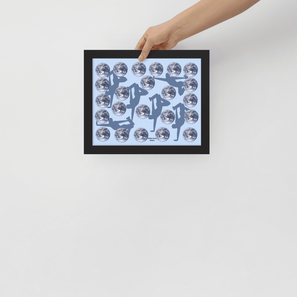 Hand holding framed dancers and globe print