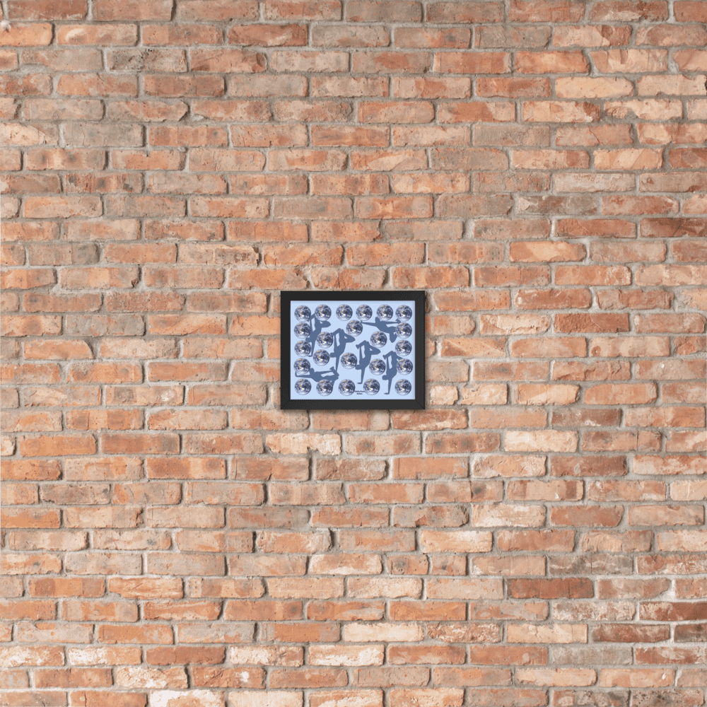 Framed collage hanging on textured brick wall