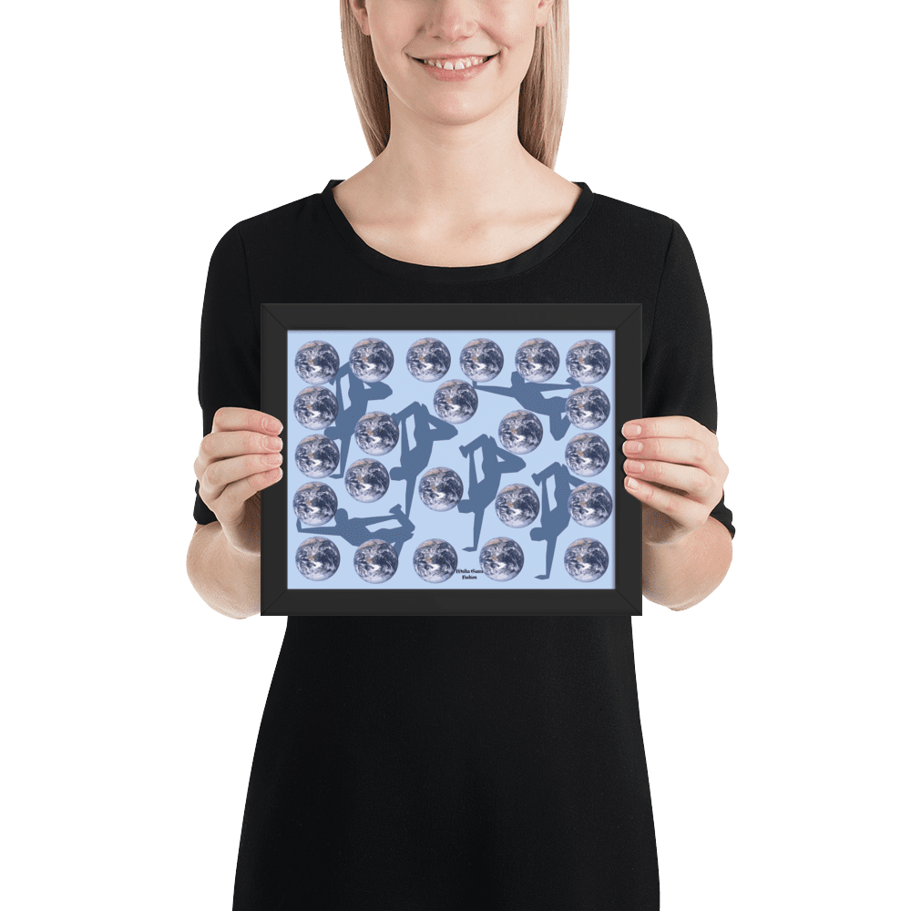 Person holding framed art with globes and silhouettes