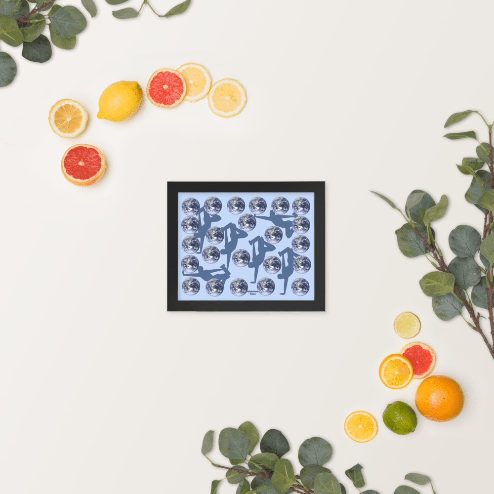 Framed globe artwork surrounded by citrus and eucalyptus