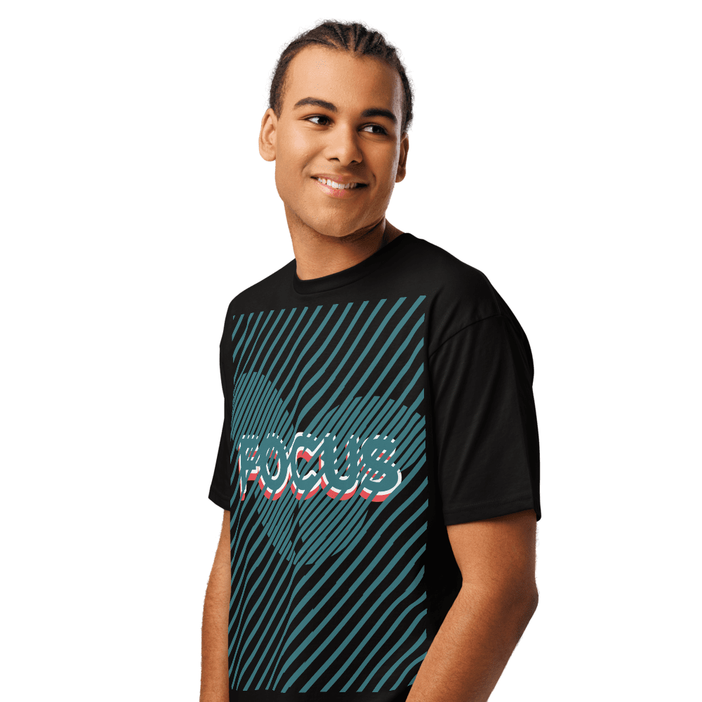 Smiling young man wearing FOCUS graphic tee