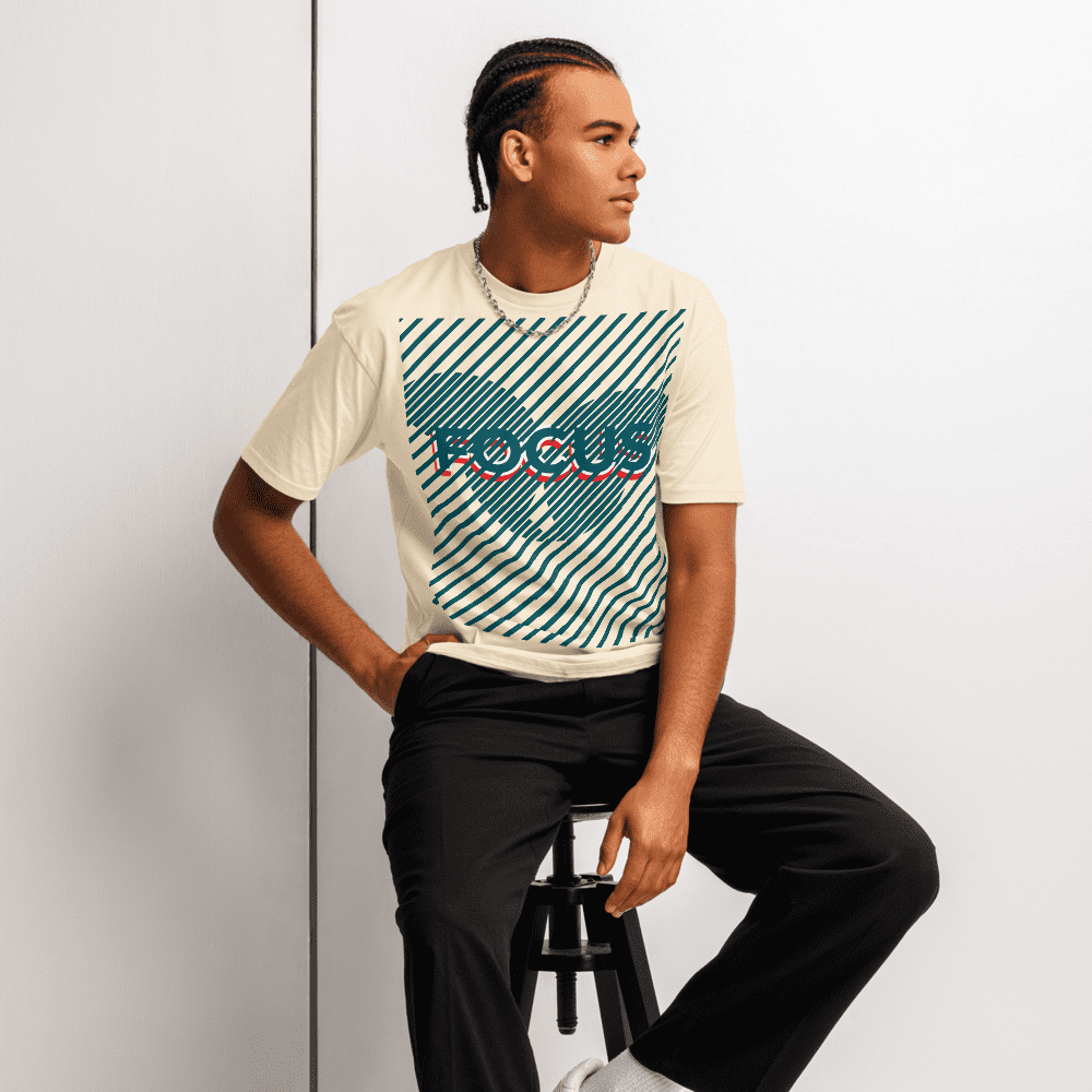 Man seated on stool wearing graphic tee